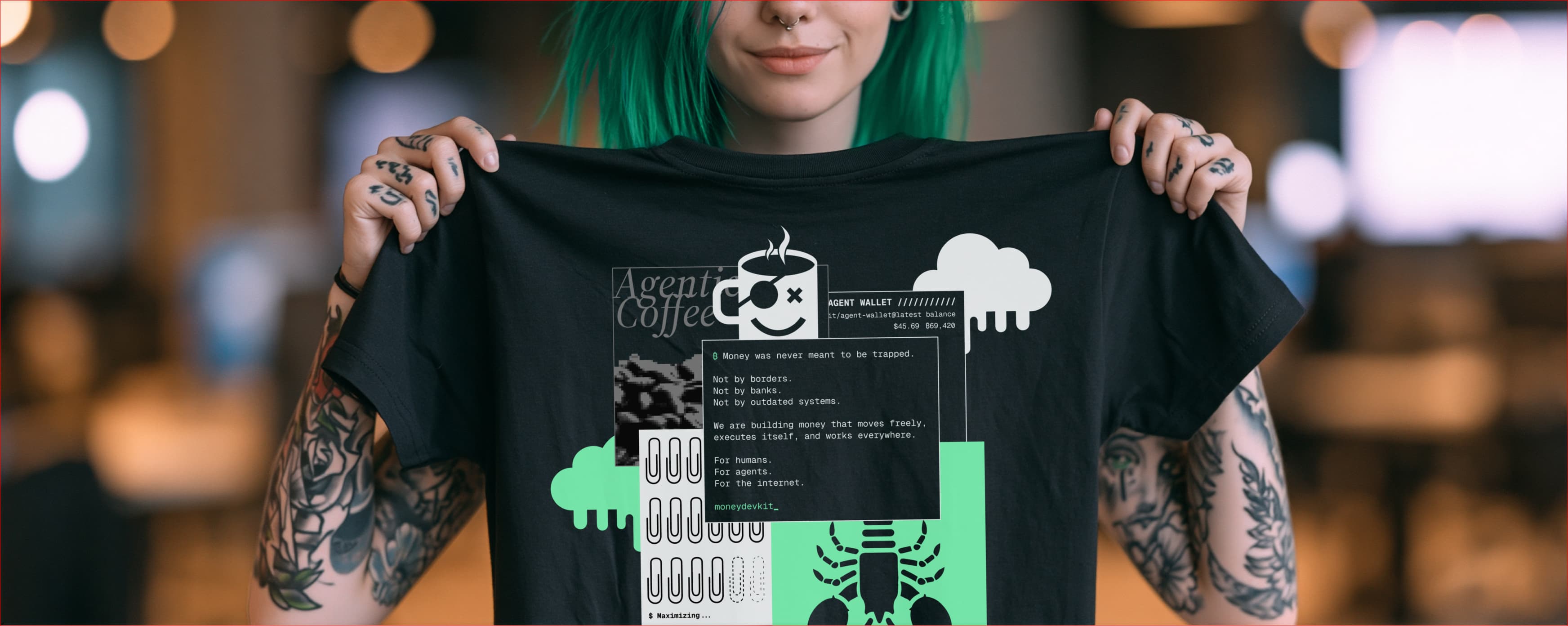 Someone holding up the black Agent Wallet tee, showing the full back graphic